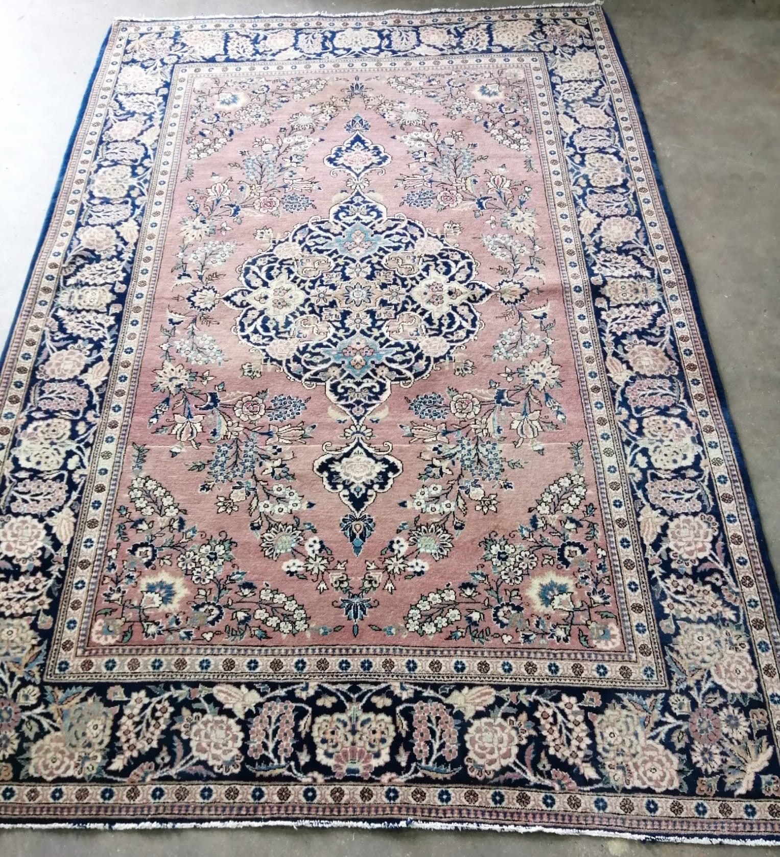A Kashmir rug, 202 x 133cm *Please note the sale commences at 9am.